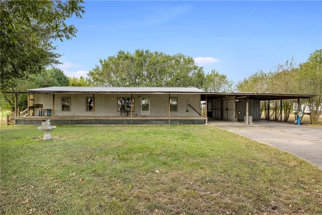 front view of a house with a patio