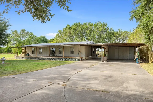 a living room with furniture a fireplace and furniture
