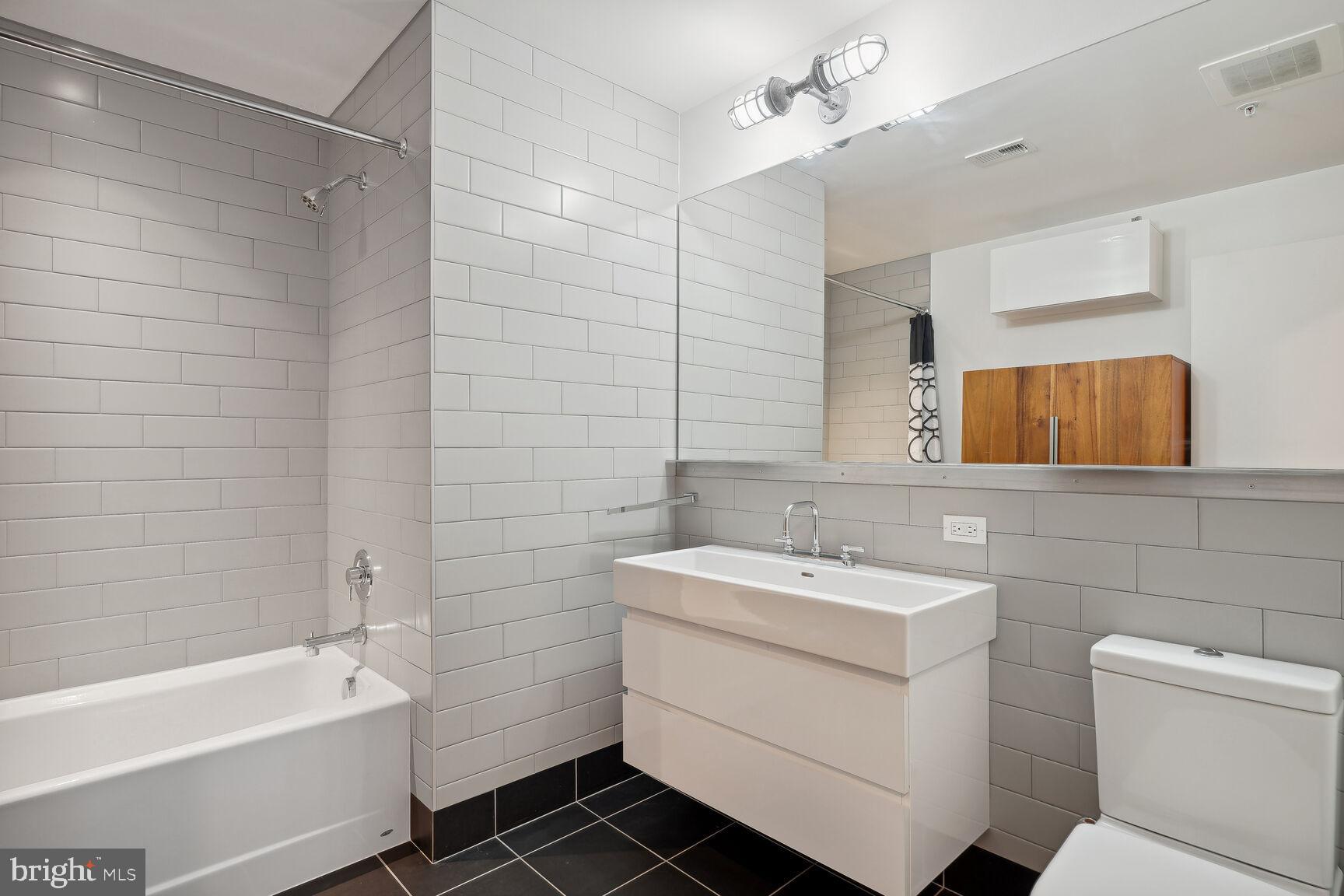 2030 8th Street Northwest, Unit PH5 Washington, DC 20001 - Photo 11 of 18 Expansive bathroom w/ storage