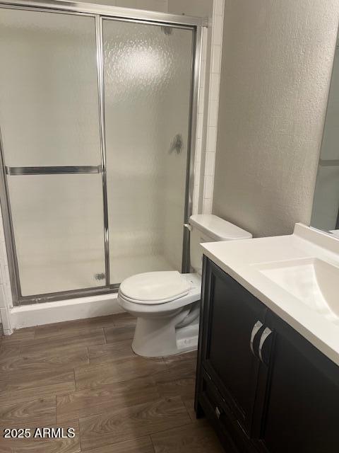 810 East Colter Street, Unit 11 Phoenix, AZ 85014 - Photo 10 of 17 a bathroom with a toilet a sink and shower
