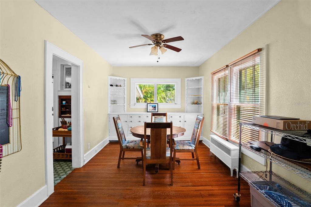 300 President Street Dunedin, FL 34698 - Photo 23 of 53 a view of a dining room with furniture window and wooden floor