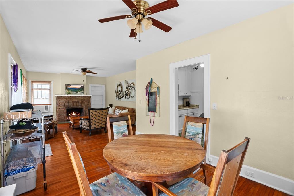 300 President Street Dunedin, FL 34698 - Photo 25 of 53 a living room with furniture a fireplace