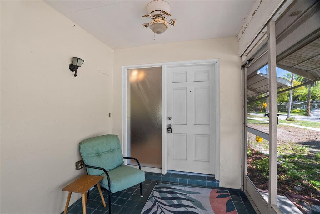 300 President Street Dunedin, FL 34698 - Photo 37 of 53 a view of a livingroom with furniture and a window