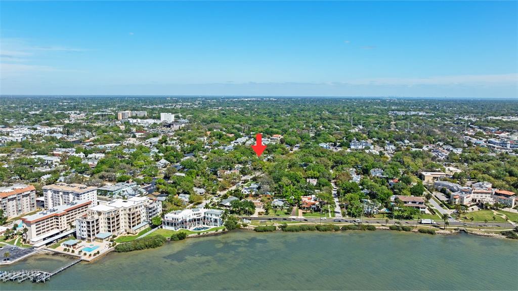 300 President Street Dunedin, FL 34698 - Photo 5 of 53 an aerial view of residential houses with outdoor space and trees