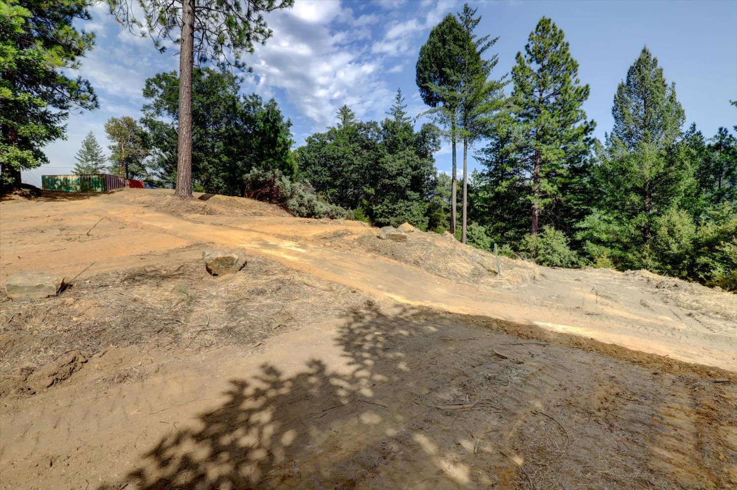 19455 Hogback Road Nevada City, CA 95959 - Photo 17 of 87 a view of a backyard of a house