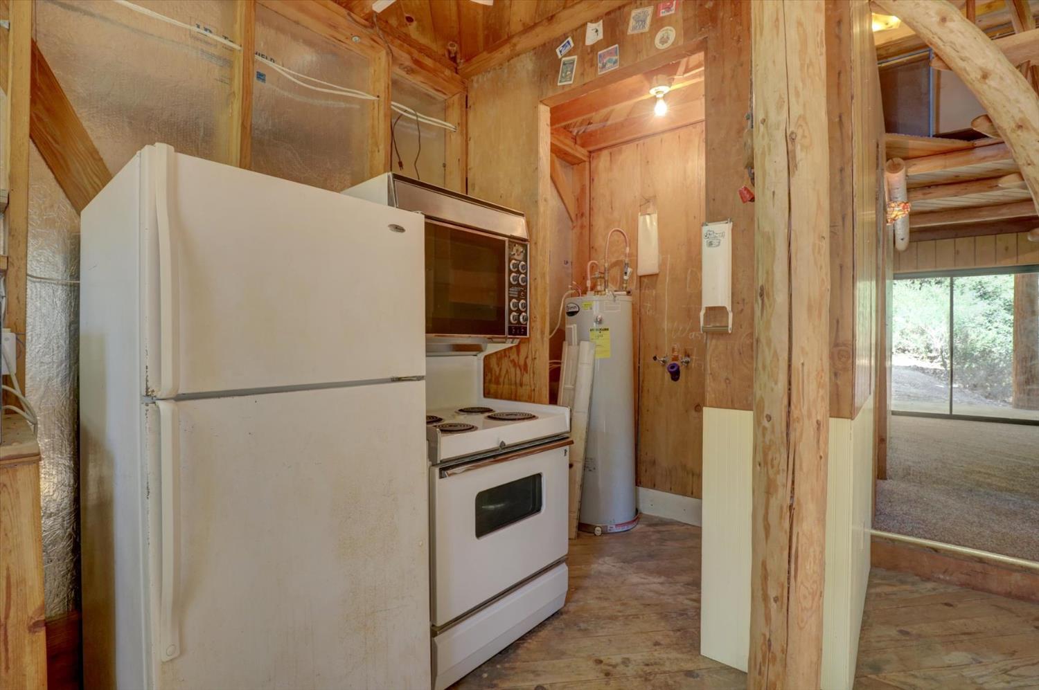 19455 Hogback Road Nevada City, CA 95959 - Photo 32 of 87 a white refrigerator freezer and a glass door