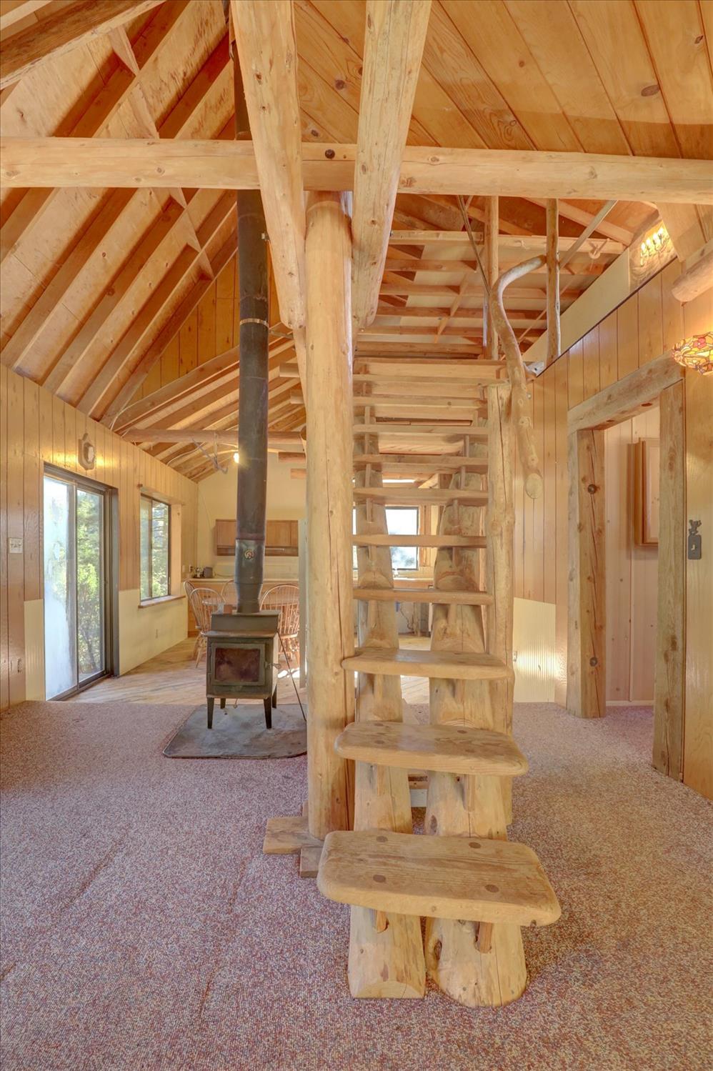 19455 Hogback Road Nevada City, CA 95959 - Photo 36 of 87 a view of a room with table and chairs
