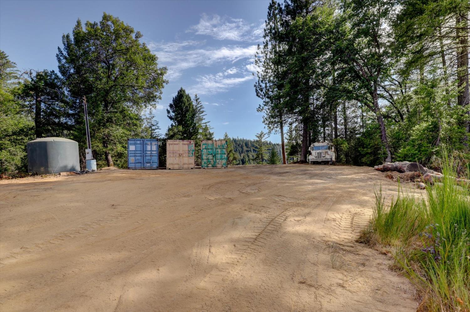 19455 Hogback Road Nevada City, CA 95959 - Photo 6 of 87 Power and water are conveniently located at the top of the potential building site, simplifying utility access for future development.