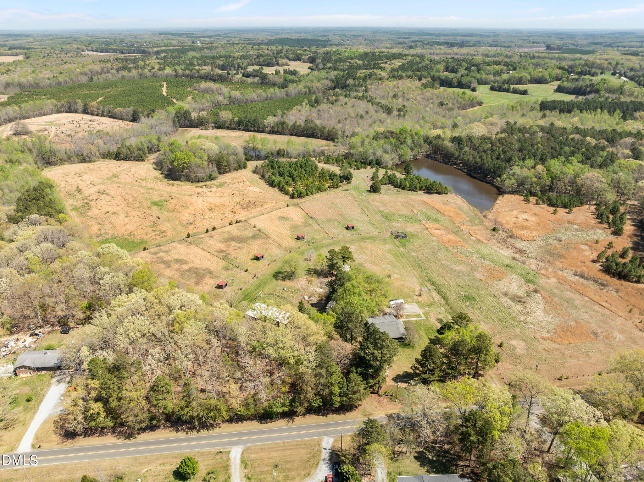 212 Thomas Humphries Road Roxboro, NC 27574 - Photo 15 of 56 a view of a lake with a mountain