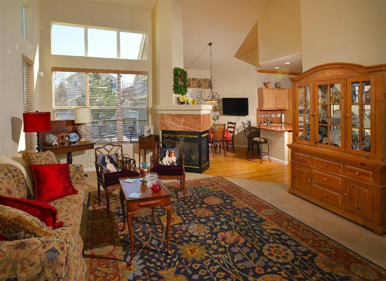 30 Eagle Ranch Road Eagle, CO 81631 - Photo 9 of 25 Living area with 3 sided fireplace and k