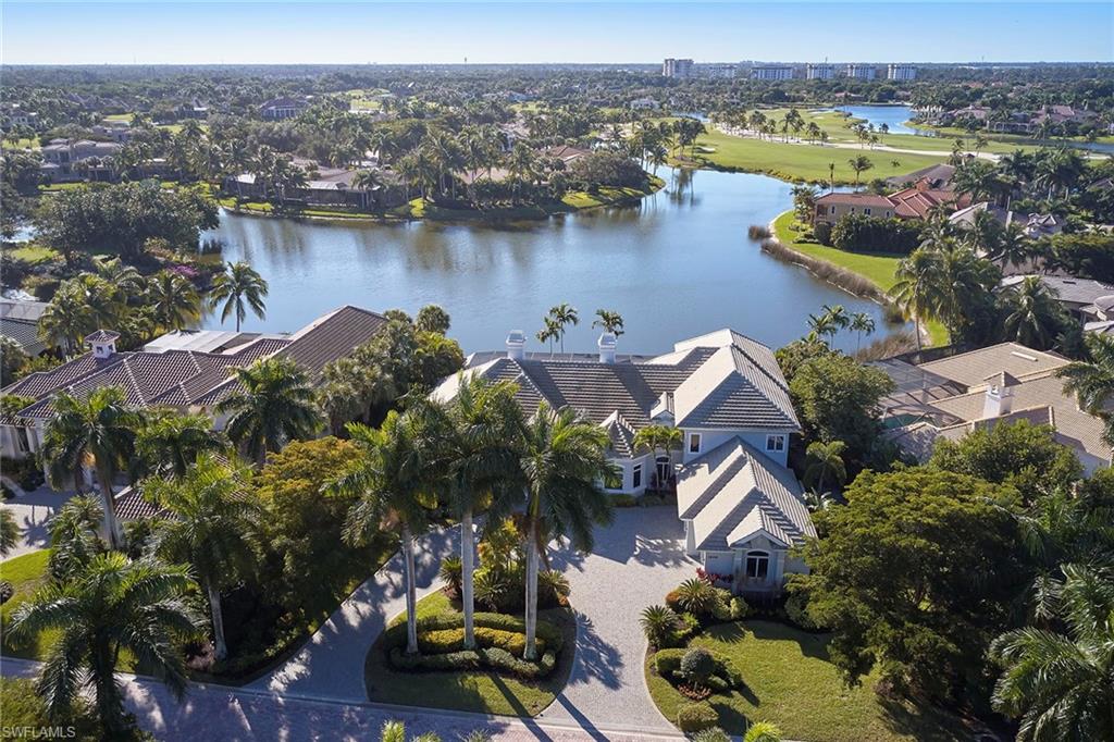 an aerial view of lake residential house with outdoor space and river