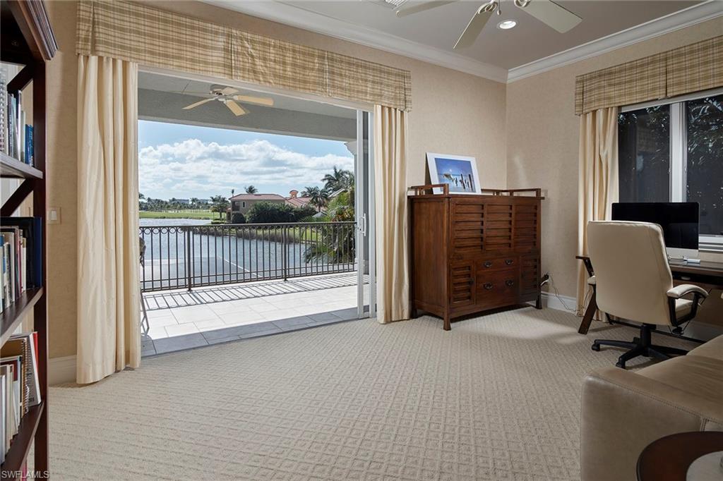 1626 Chinaberry Way Naples, FL 34105 - Photo 20 of 35 a view of a livingroom with furniture and a window