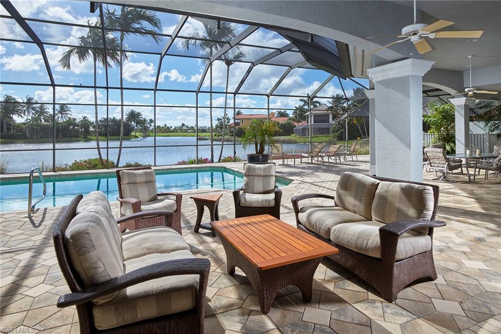 1626 Chinaberry Way Naples, FL 34105 - Photo 25 of 35 a outdoor living space with furniture