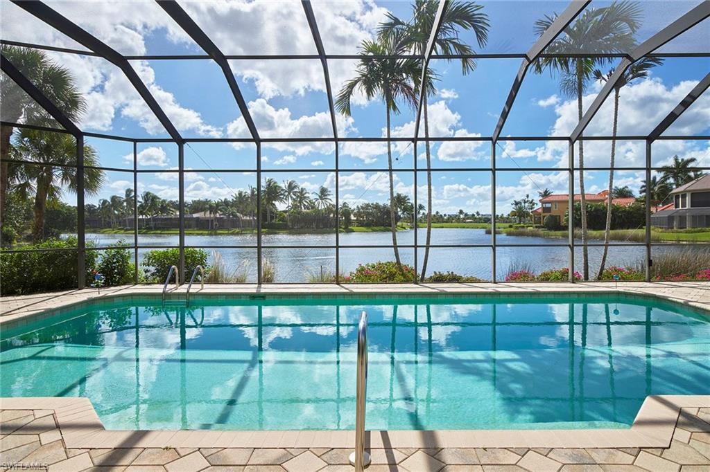 1626 Chinaberry Way Naples, FL 34105 - Photo 4 of 35 a view of outdoor space with a swimming pool