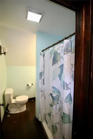 a bathroom with a sink and toilet