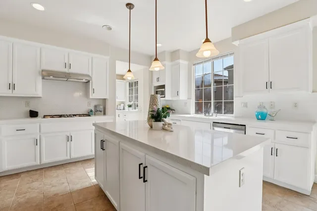 a room with cabinets and window