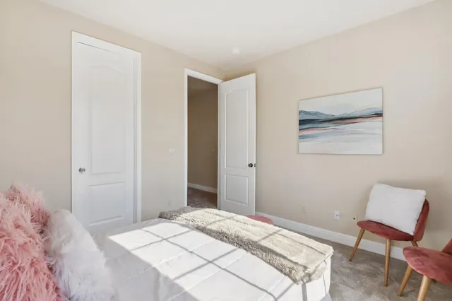 a bathroom with a tub a sink and a shower