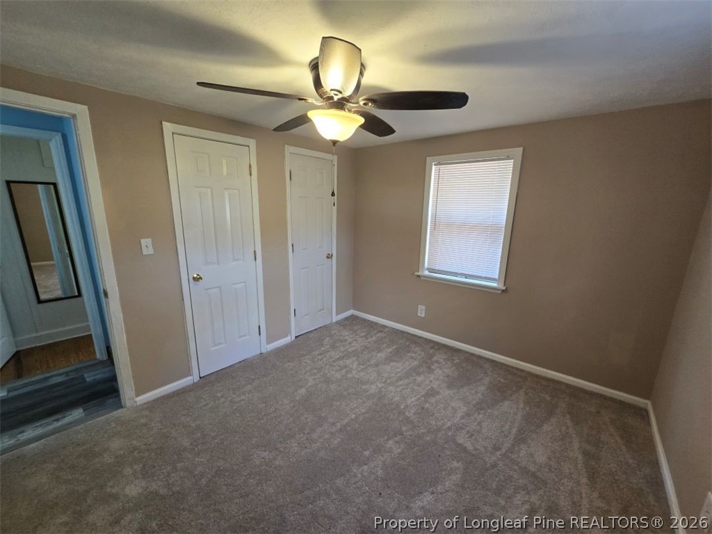 219 East Clinton Street Autryville, NC 28318 - Photo 12 of 32 a view of an empty room with a window