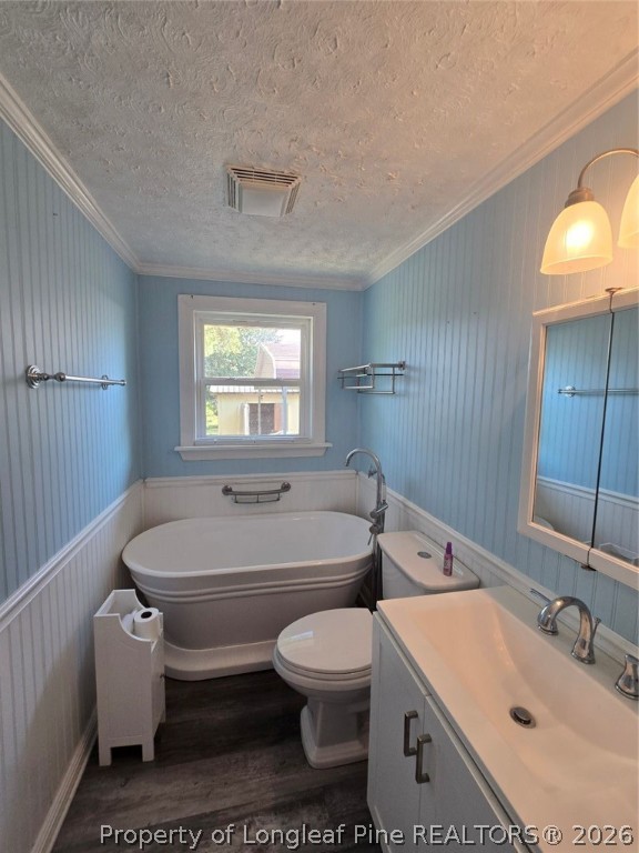 219 East Clinton Street Autryville, NC 28318 - Photo 20 of 32 a bathroom with a toilet sink and bathtub