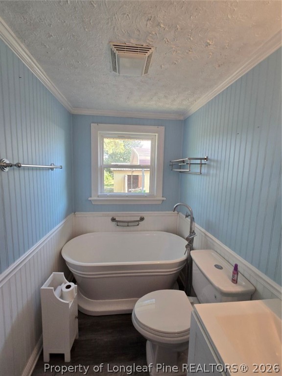 219 East Clinton Street Autryville, NC 28318 - Photo 22 of 32 a bathroom with a toilet and a sink
