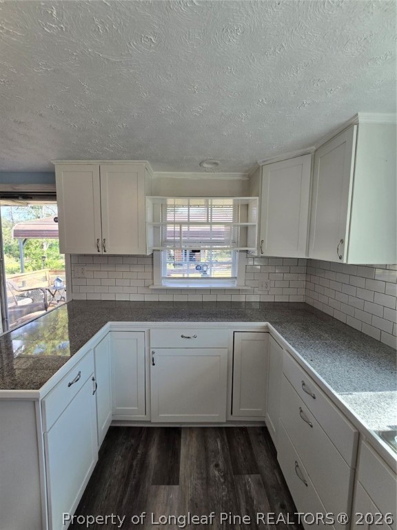219 East Clinton Street Autryville, NC 28318 - Photo 10 of 32 a kitchen with a sink and cabinets