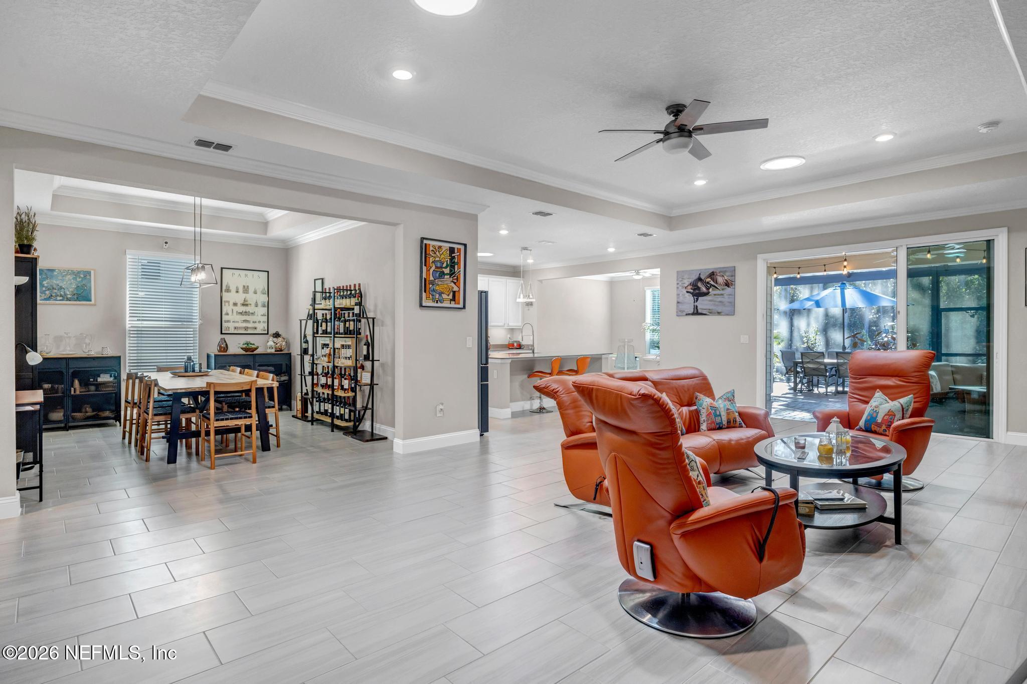 196 Silver Reef Lane St. Augustine, FL 32095 - Photo 15 of 62 a living room with furniture and a table