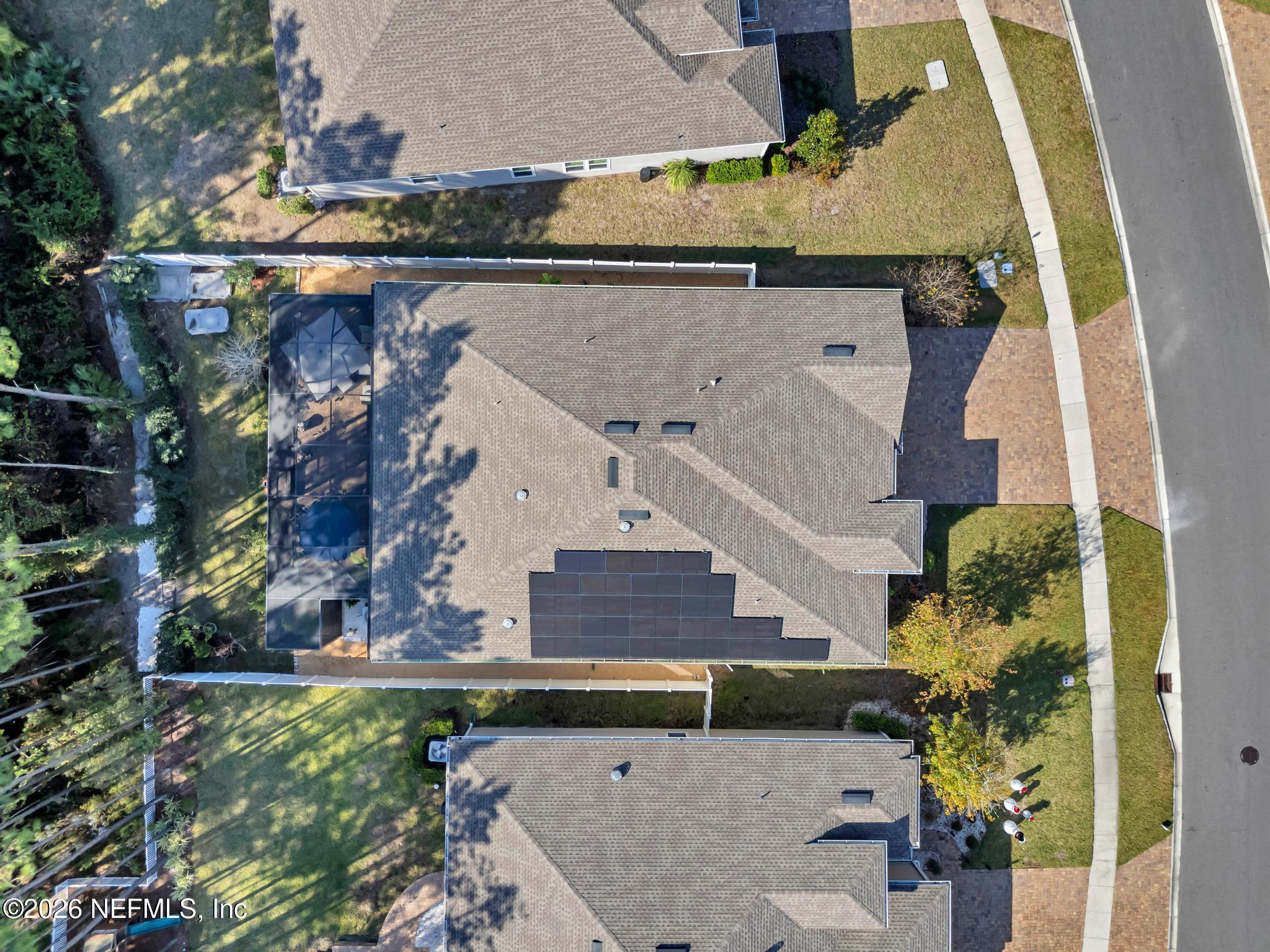 196 Silver Reef Lane St. Augustine, FL 32095 - Photo 50 of 62 an aerial view of a house with a yard
