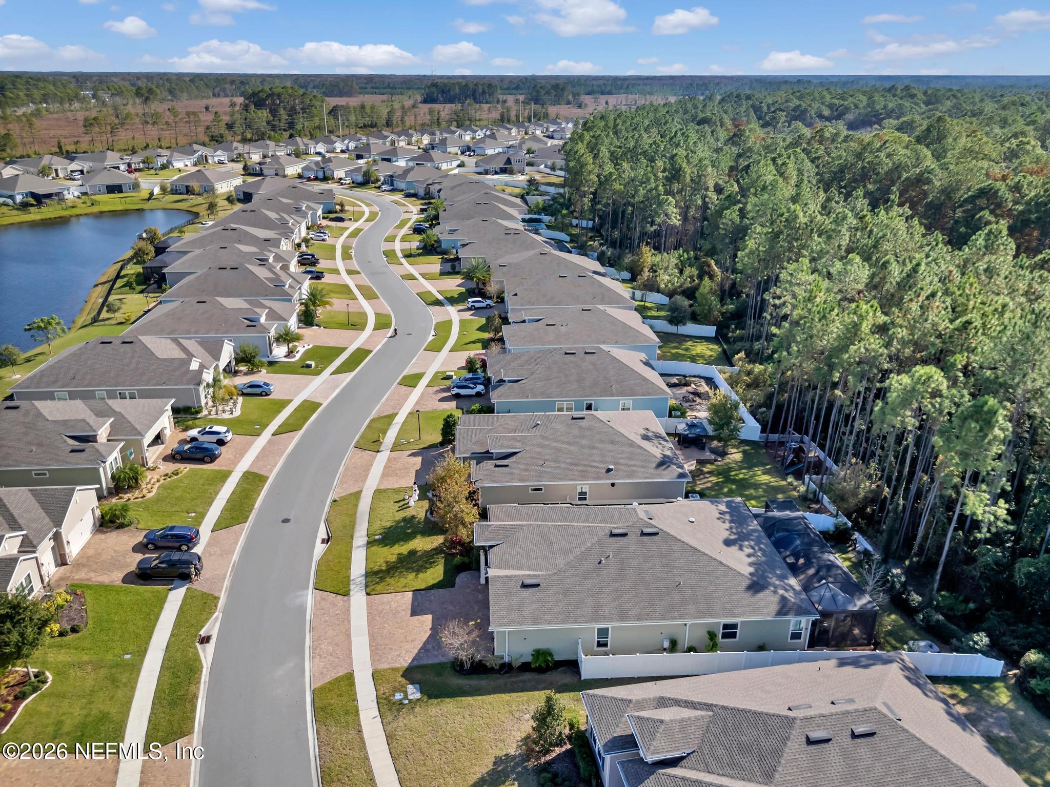 196 Silver Reef Lane St. Augustine, FL 32095 - Photo 52 of 62 a view of a city with lawn chairs
