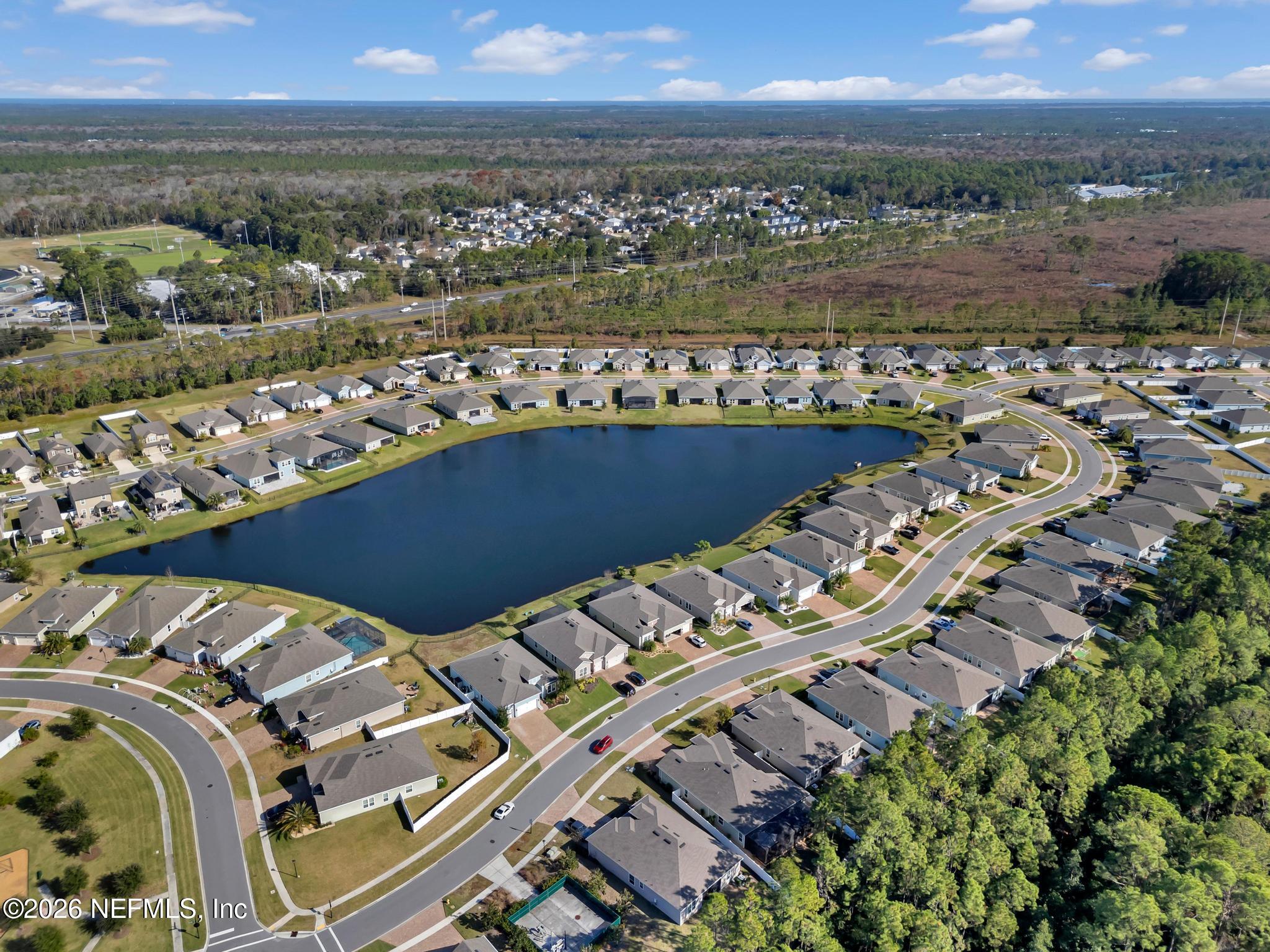196 Silver Reef Lane St. Augustine, FL 32095 - Photo 55 of 62 a view of a city with an ocean view