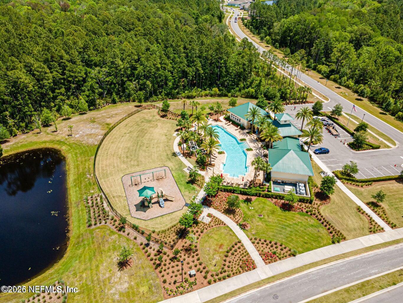 196 Silver Reef Lane St. Augustine, FL 32095 - Photo 57 of 62 a view of swimming pool with a yard