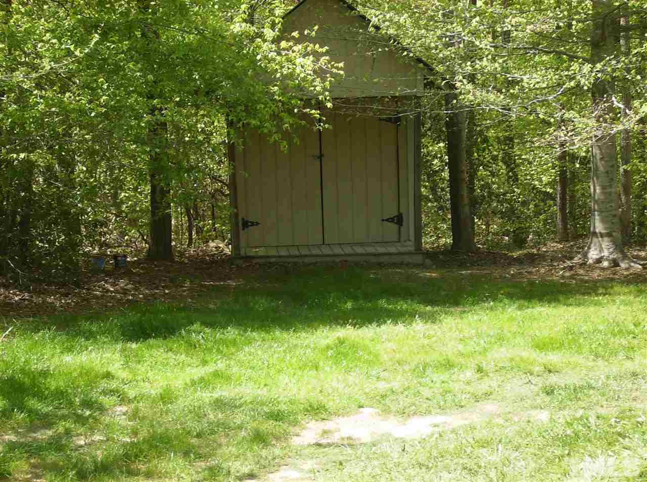 1077 Harris Mill Road Rougemont, NC 27572 - Photo 9 of 9 a view of a back yard