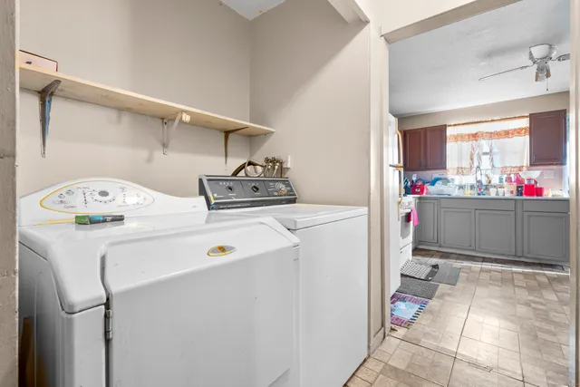 a utility room with dryer and washer