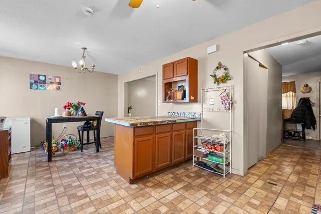 a view of kitchen with windows