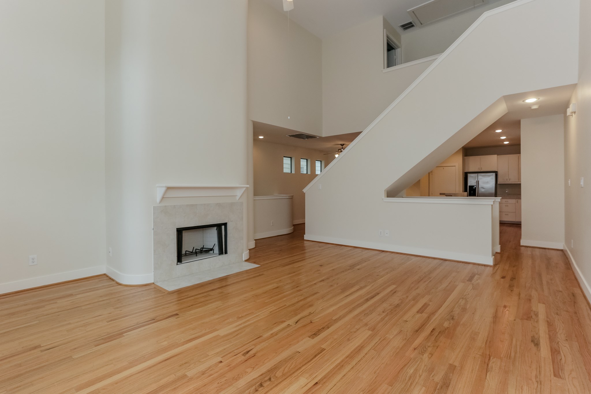 2705 Rutland Street, Unit B Houston, TX 77008 - Photo 10 of 21 Alternate angle of the large Living Room looking towards the Kitchen and stairs.