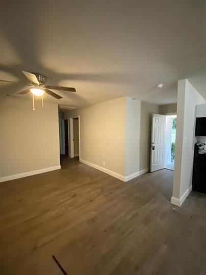 313 North Church Street Blue Ridge, TX 75424 - Photo 8 of 11 a view of an empty room with a fireplace