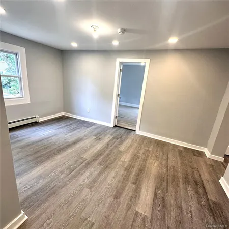 a view of a electric appliances in kitchen and empty room