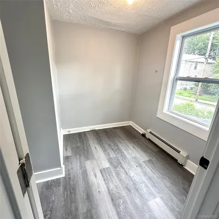 a bathroom with a sink a toilet and a bathtub