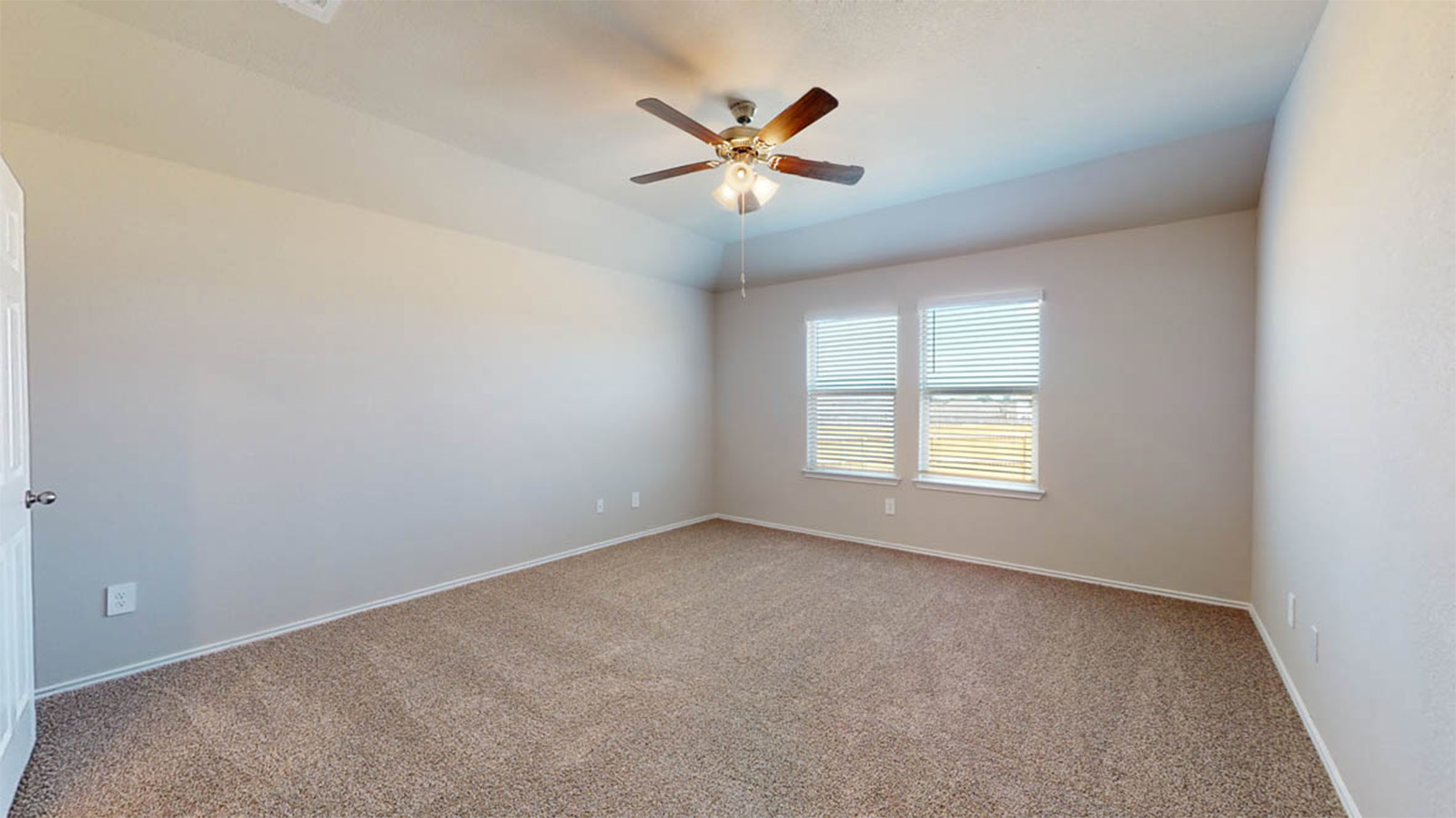 148 McNamara Court Jarrell, TX 76537 - Photo 9 of 22 Spare room with carpet and a ceiling fan