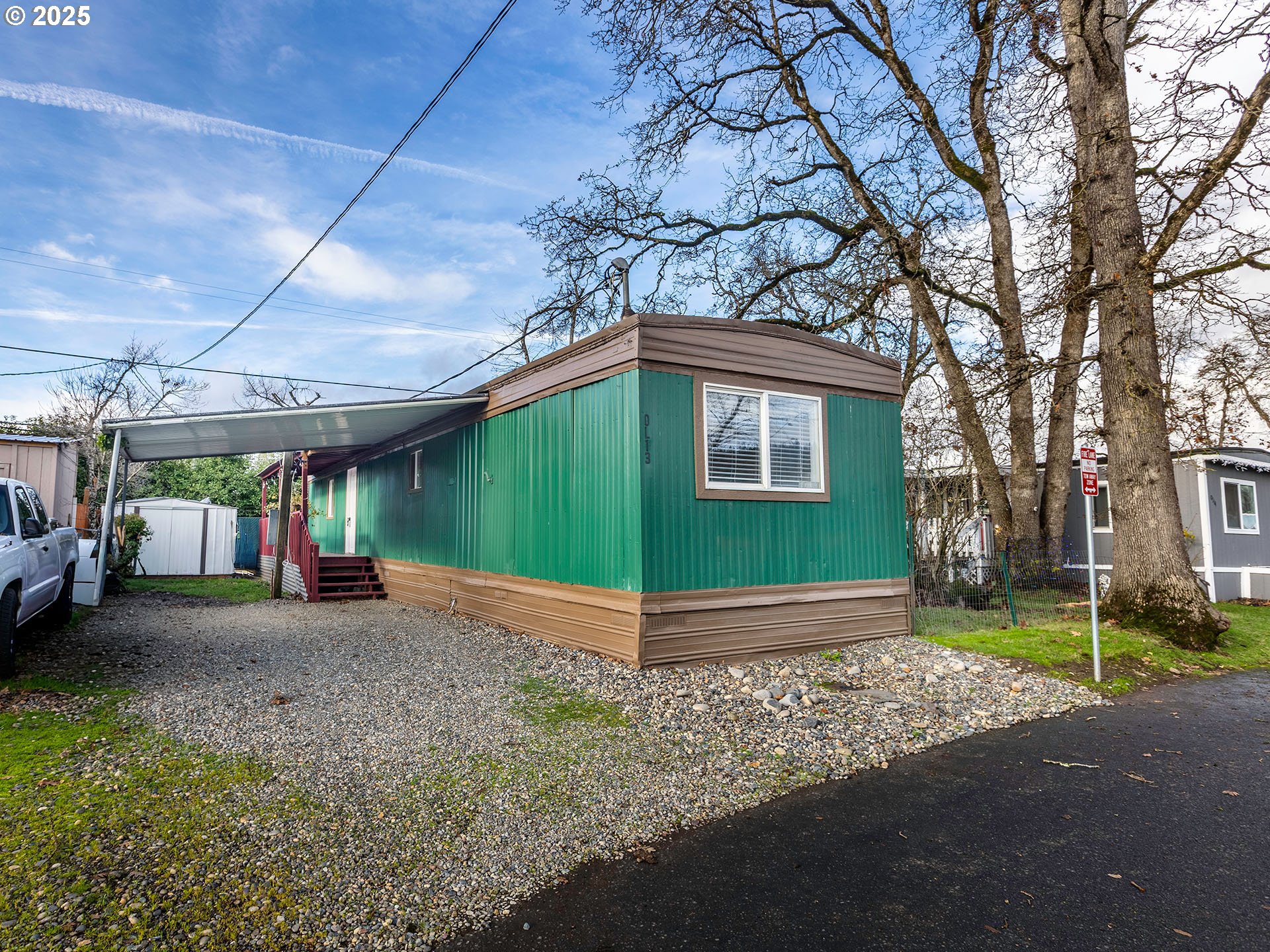 10701 Southeast Highway 212, Unit 13 Clackamas, OR 97015 - Photo 1 of 26 a view of a backyard