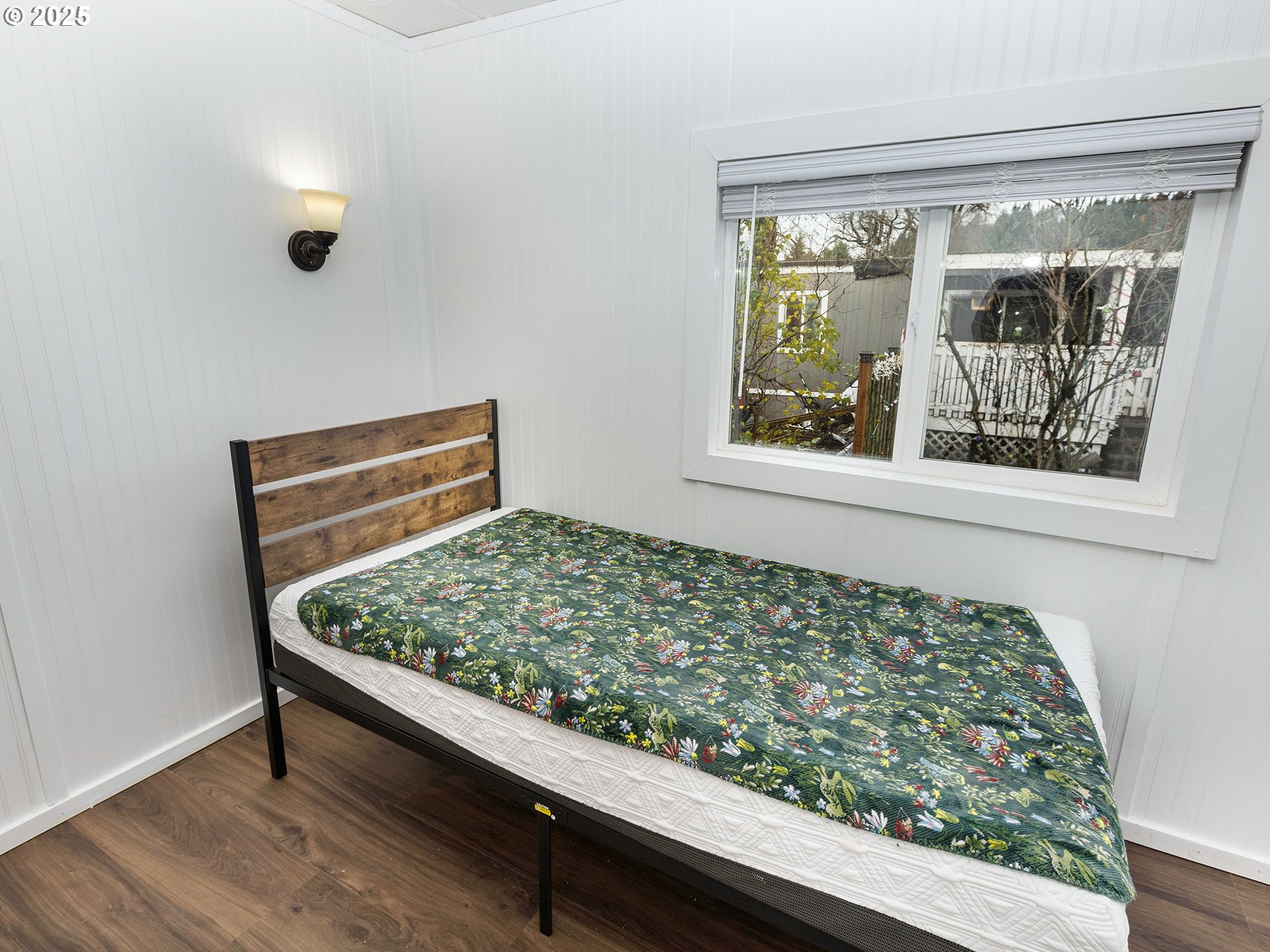 10701 Southeast Highway 212, Unit 13 Clackamas, OR 97015 - Photo 13 of 26 a wooden bench sitting in front of a window