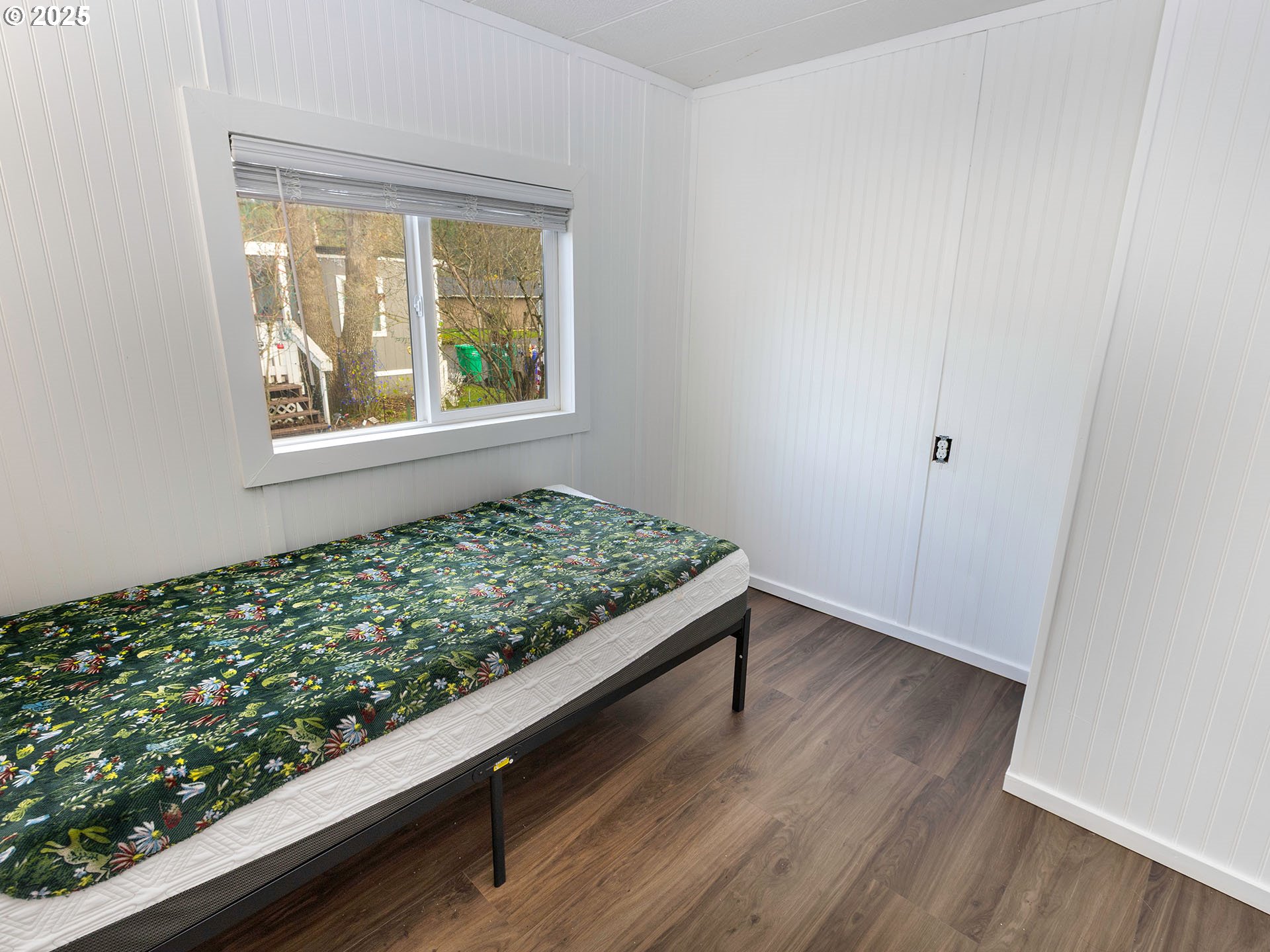 10701 Southeast Highway 212, Unit 13 Clackamas, OR 97015 - Photo 14 of 26 a view of wooden floor and a window