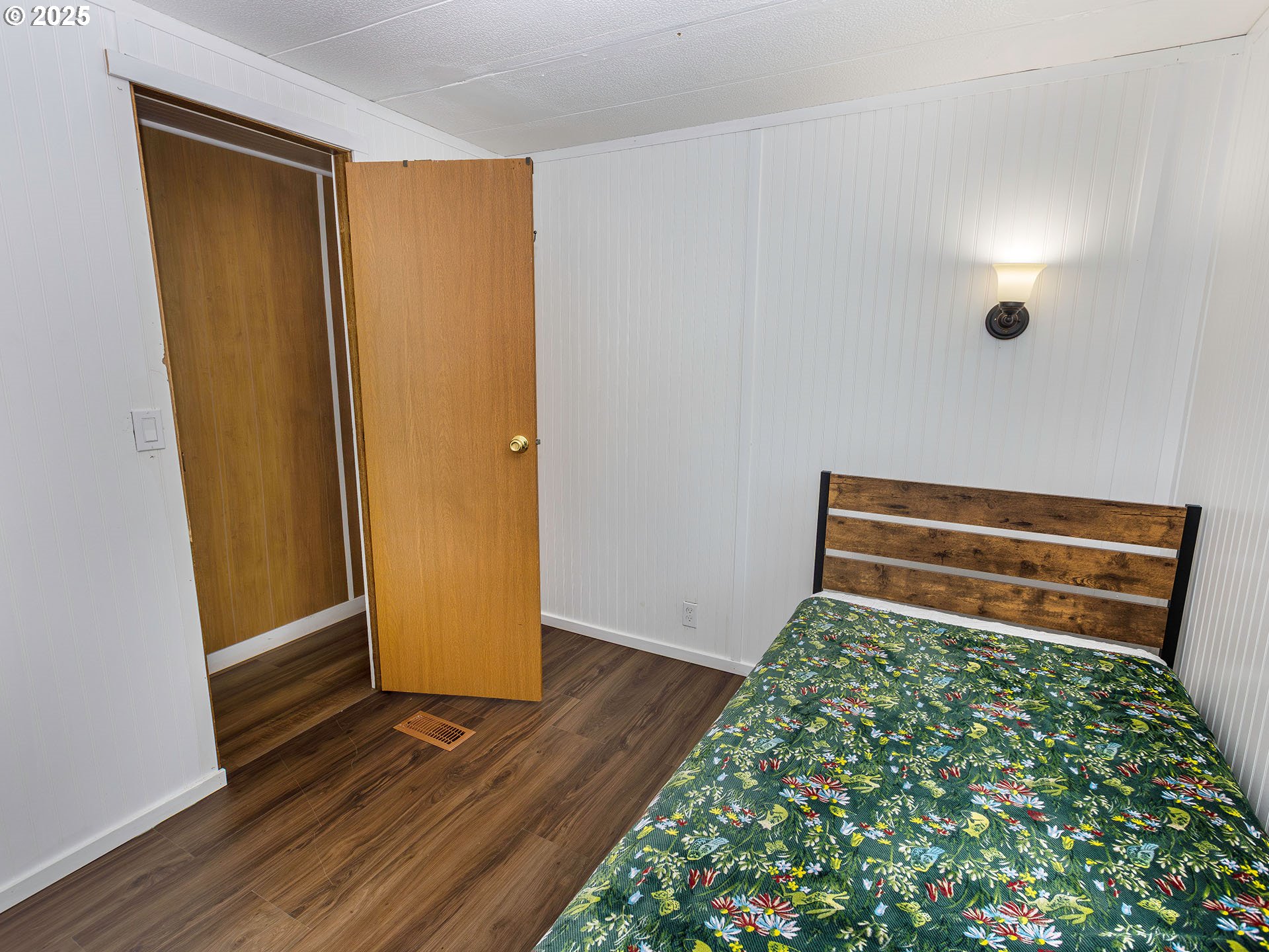 10701 Southeast Highway 212, Unit 13 Clackamas, OR 97015 - Photo 15 of 26 a view of room with wooden floor and front door