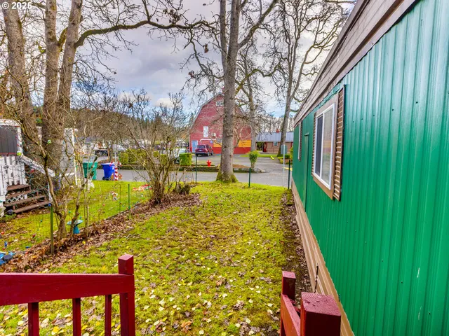 a view of swimming pool with a yard