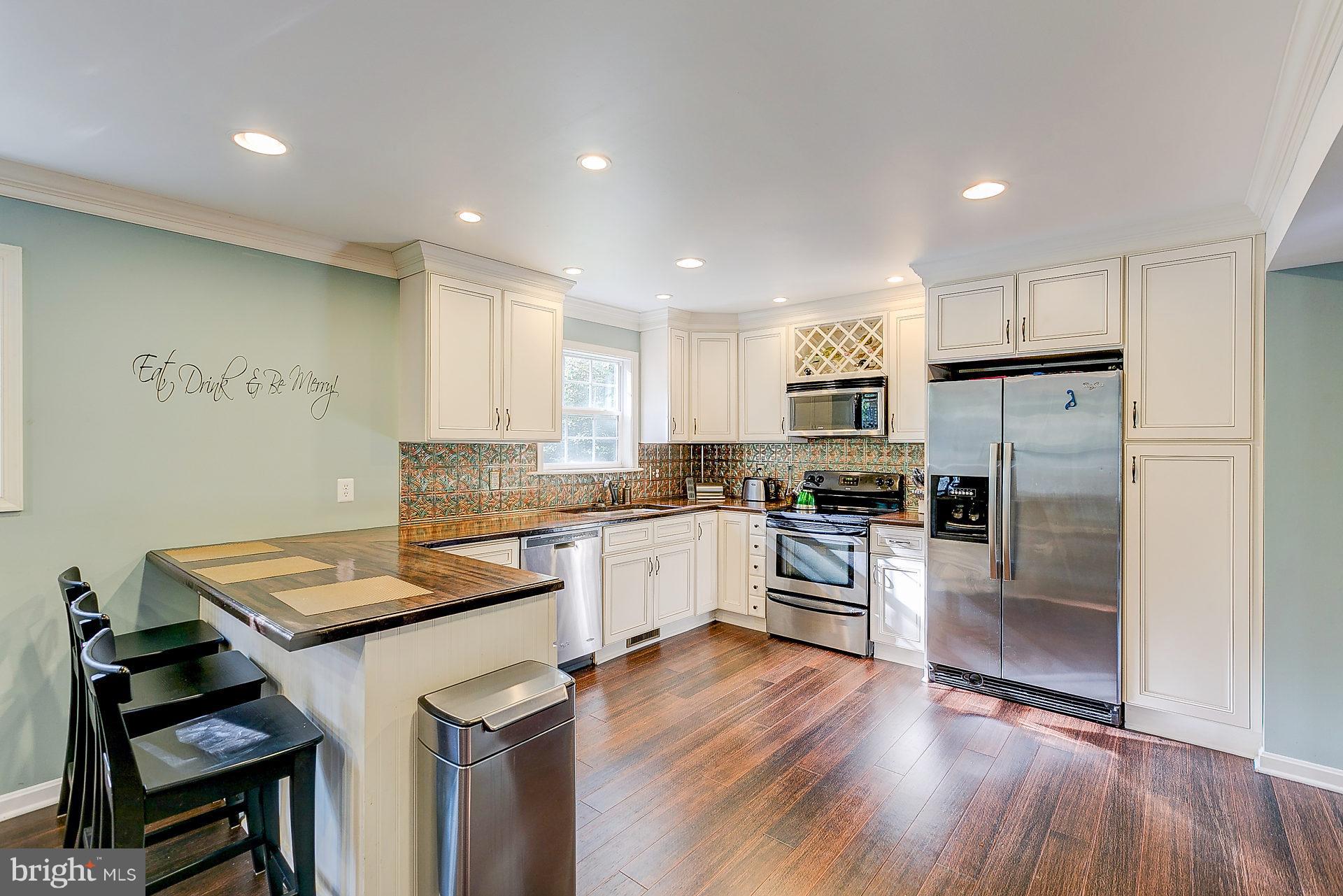 7025 Saw Mill Road Lusby, MD 20657 - Photo 8 of 30 Upgraded Appliances, Fixtures and Flooring