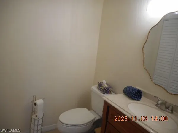 a bathroom with a toilet and a sink