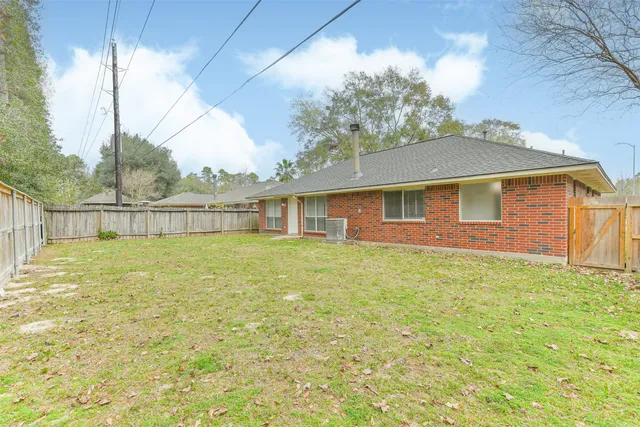 a view of a yard with a house and garden