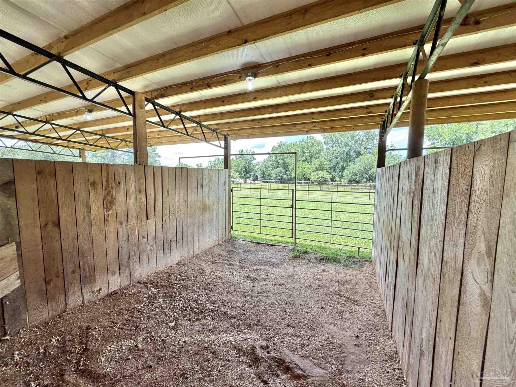 145 Tower Road Uriah, AL 36480 - Photo 38 of 72 a view of a backyard with wooden fence