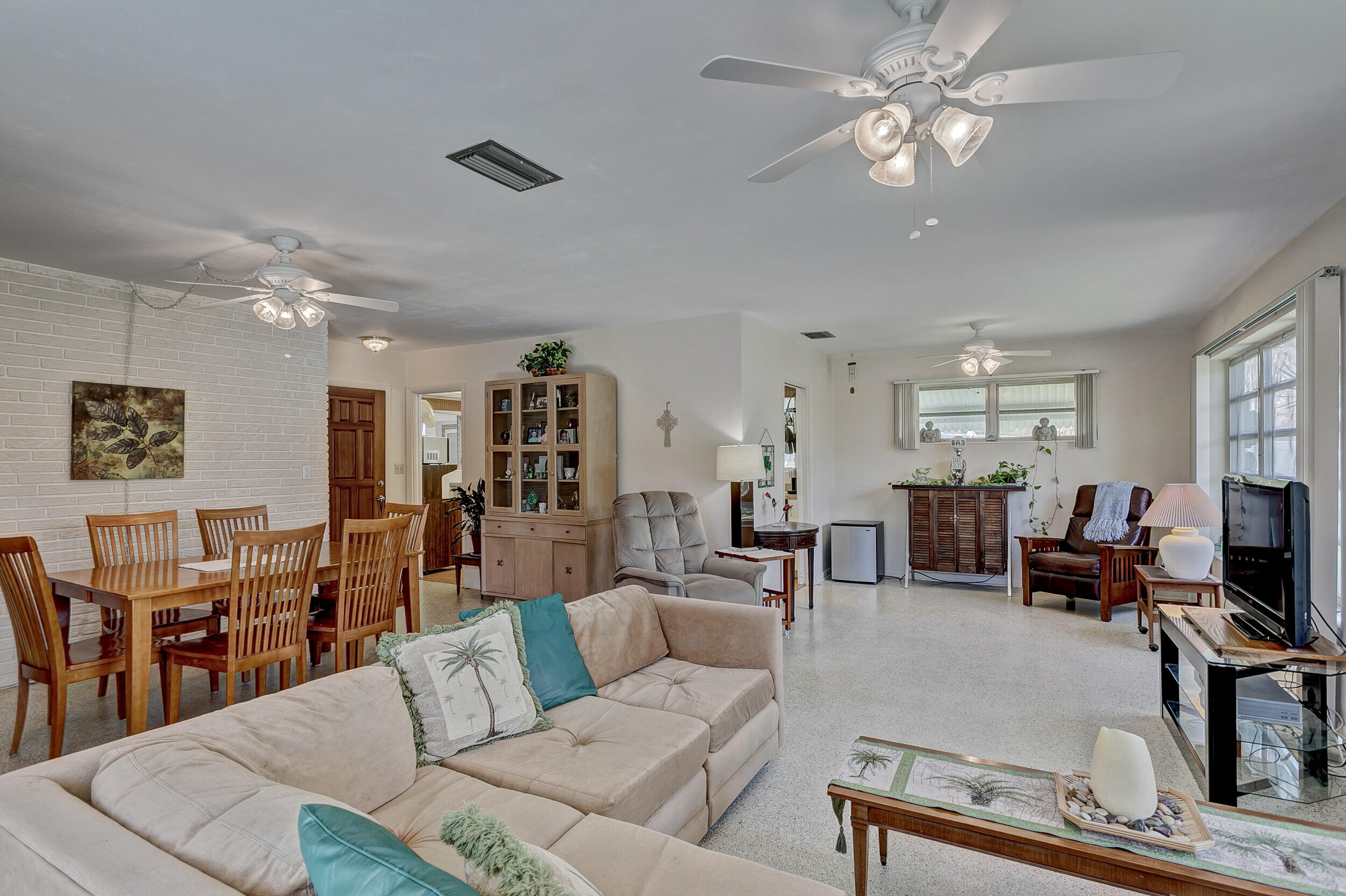 501 Inlet Road North Palm Beach, FL 33408 - Photo 11 of 58 a living room with furniture kitchen view and a window