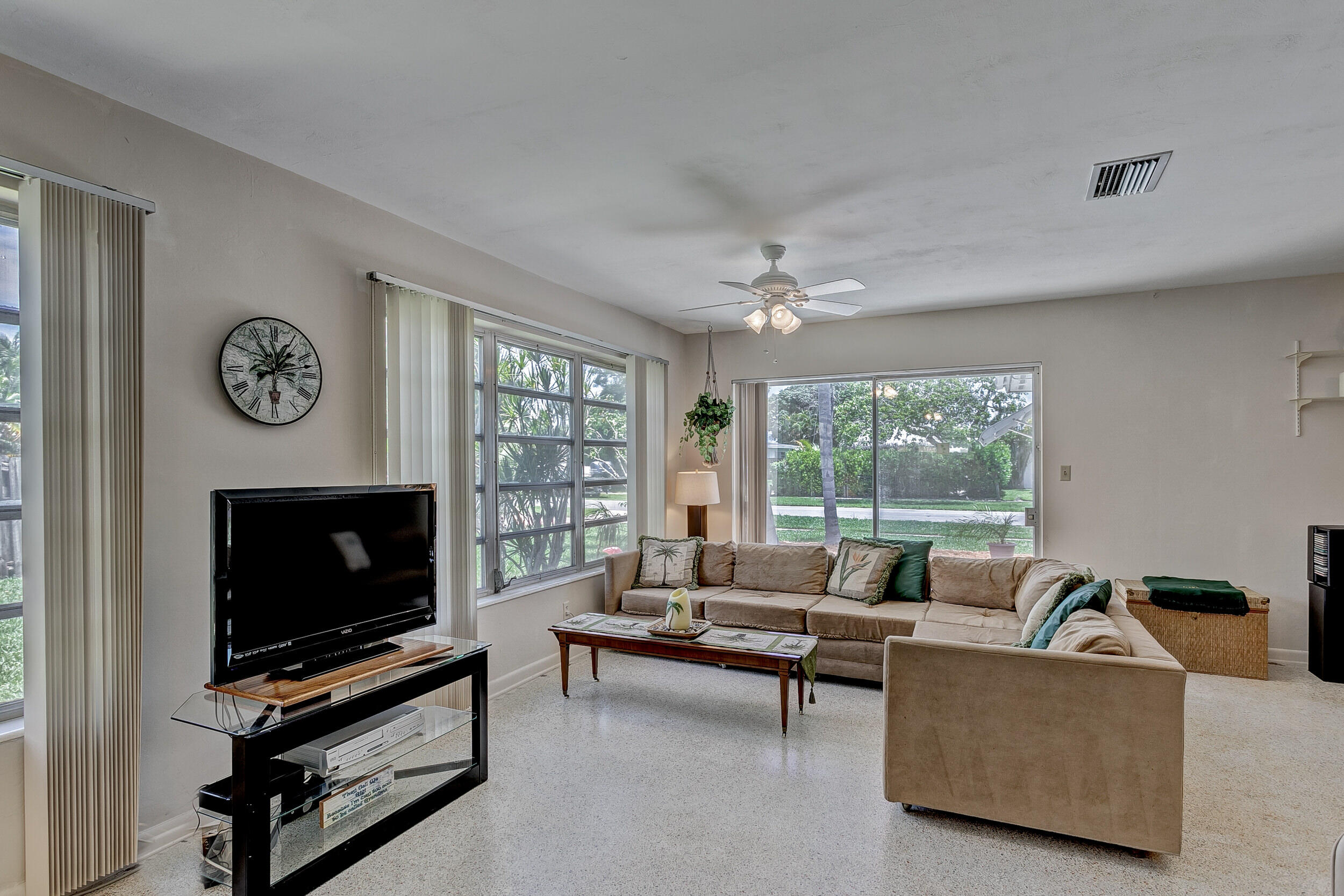 501 Inlet Road North Palm Beach, FL 33408 - Photo 12 of 58 a living room with furniture and a flat screen tv