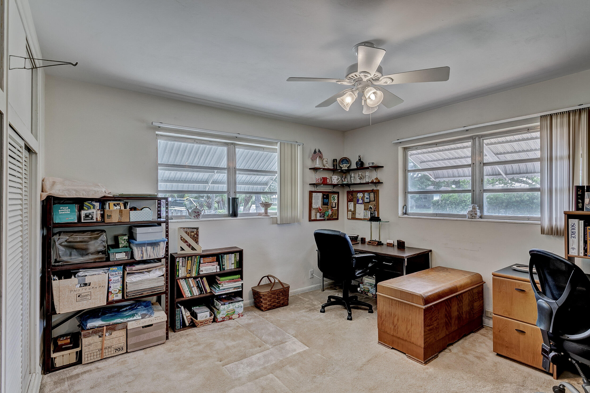 501 Inlet Road North Palm Beach, FL 33408 - Photo 22 of 58 a view of a workspace with furniture and a window